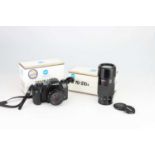 A Minolta Dynax 600si Classic SLR Camera,