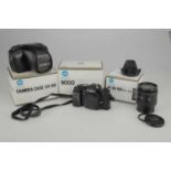 A Minolta Dynax 9000 SLR Camera,