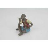 A Cold Cast Bronze of a Seated Gentleman,