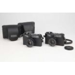 Two Yashica MG-1 35mm Rangefinder Cameras,