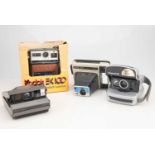 A Selection of Four Instant Cameras,