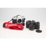 A Canon AE-1 35mm SLR Camera,