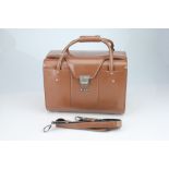 A NIkon Brown Leather Outfit Case,