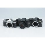 Three Pentax 35mm SLR Cameras,