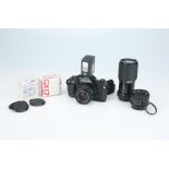 A Canon A-1 35mm SLR Camera Outfit,