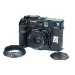 A Mamiya 6 Medium Format Rangefinder Camera,