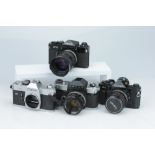 A Selection of Four Canon 35mm SLR Cameras,