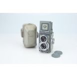 A Rollei Rolleiflex Baby Grey 4x4 TLR Camera,