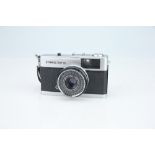 An Olympus Trip 35 Compact Camera,