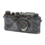 A Fire Damaged Leica IIIc Rangefinder Camera,