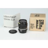 A Nikon Micro-Nikkor f/2.8 55mm Lens,