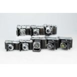 A Selection of Eight Folding Cameras,