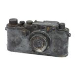A Fire Damaged Leica IIIc Rangefinder Camera,