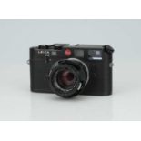 A Leica M6 Rangefinder Camera,