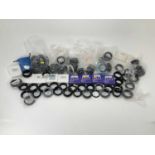 A Large Quantity of T2 Mount Adapters,