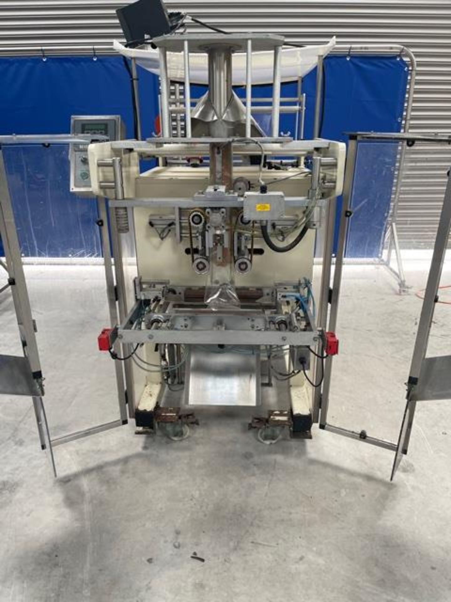 TECHNOSYS CYCLONE 300 VERTICAL FORM FILL & SEAL MACHINE.