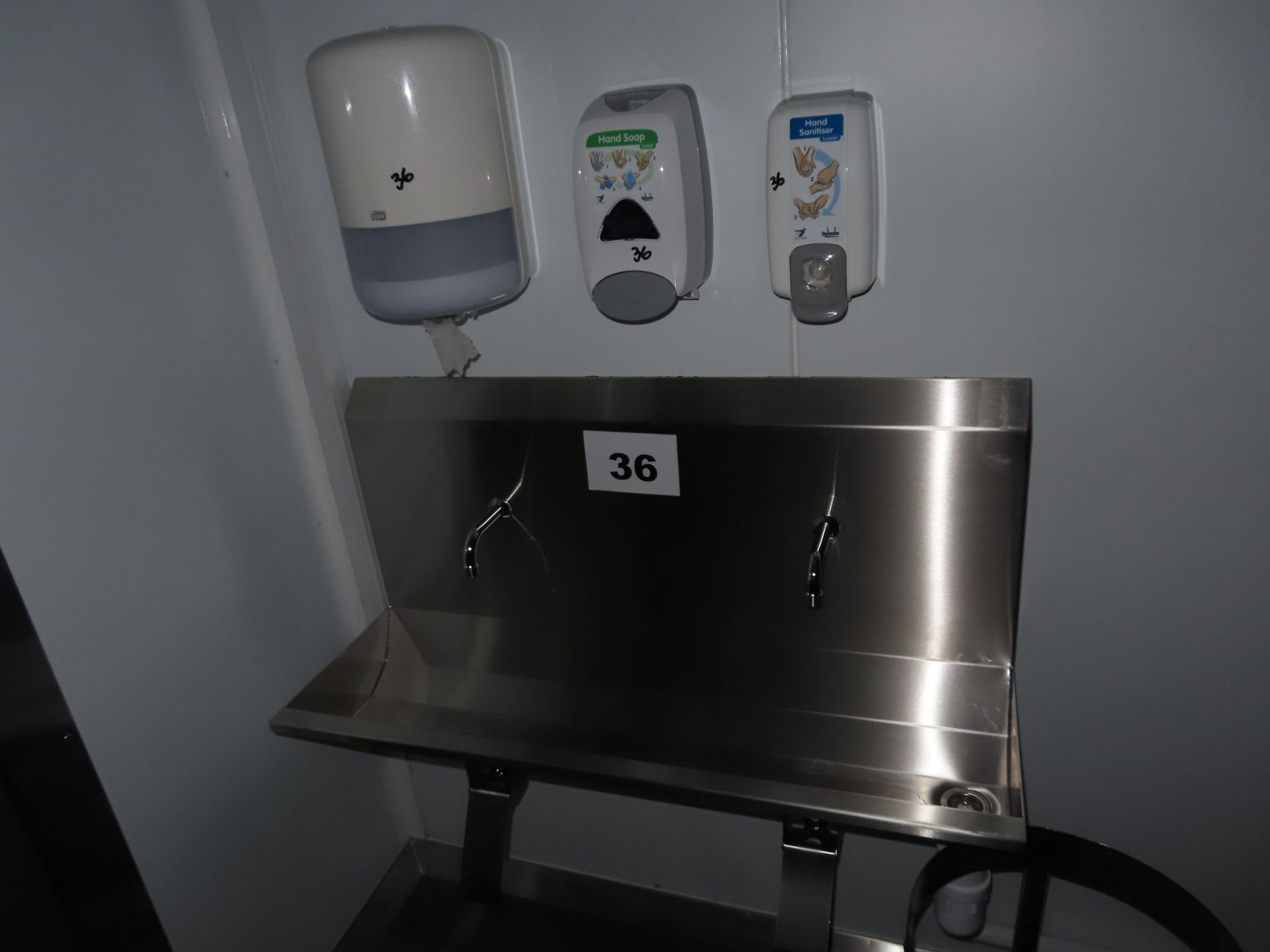 DOUBLE KNEE OPERATED SINK.