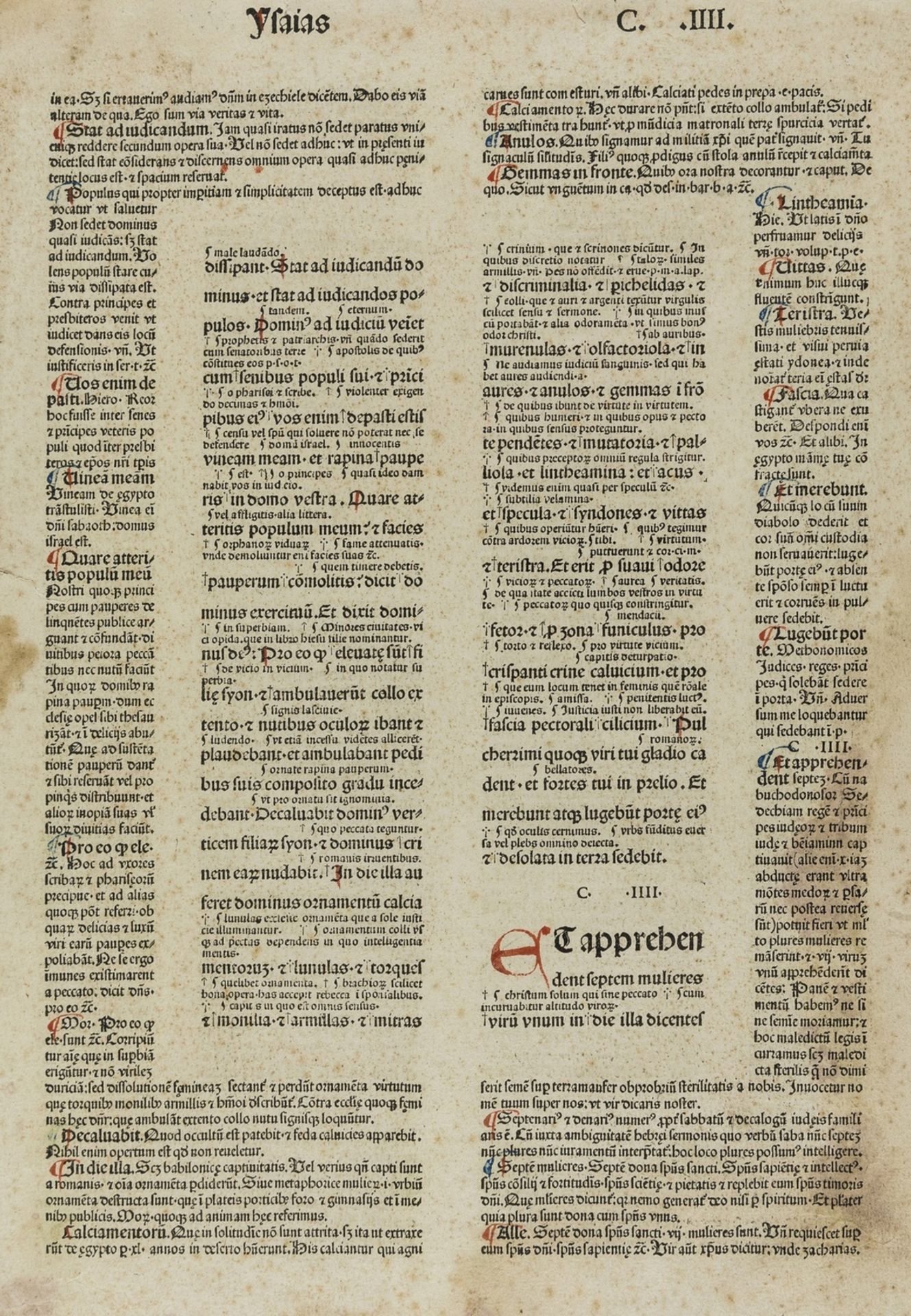 Bible, Latin. Leaf from Isaiah with commentaries, initials rubricated in red and blue, double …