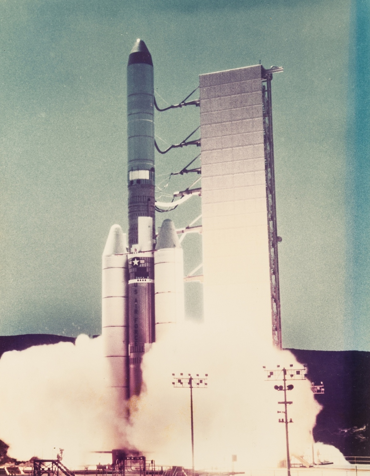 Rockets.- , A good group of Titan and other rockets on the launch pad and at lift-off, 1961, …