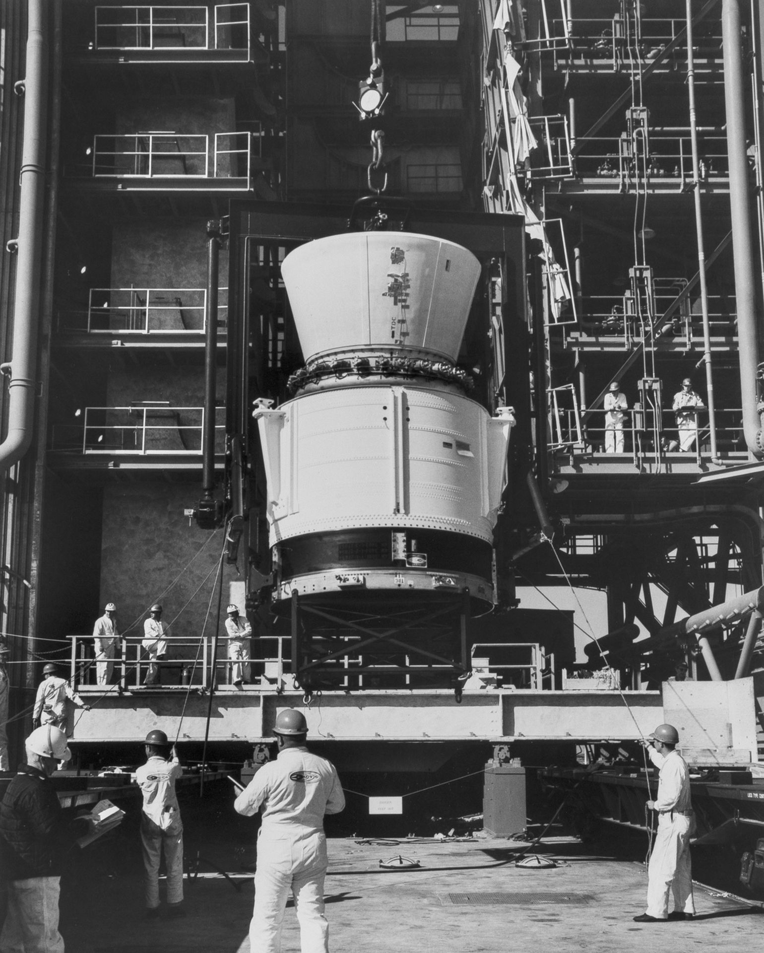 Assembly of the Titan III-C rocket, c.1965, together 3 vintage gelatin silver prints (3).