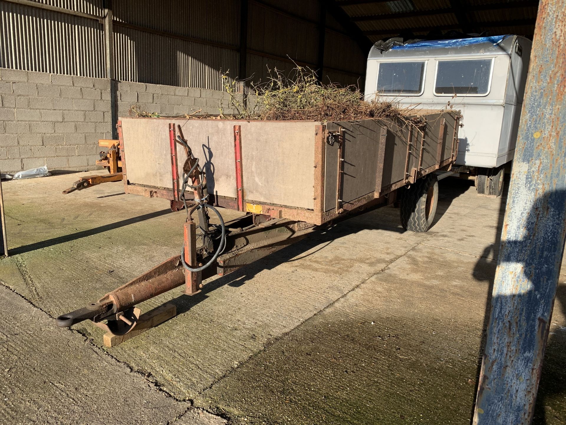 Tye single axle tipping trailer with drop sides