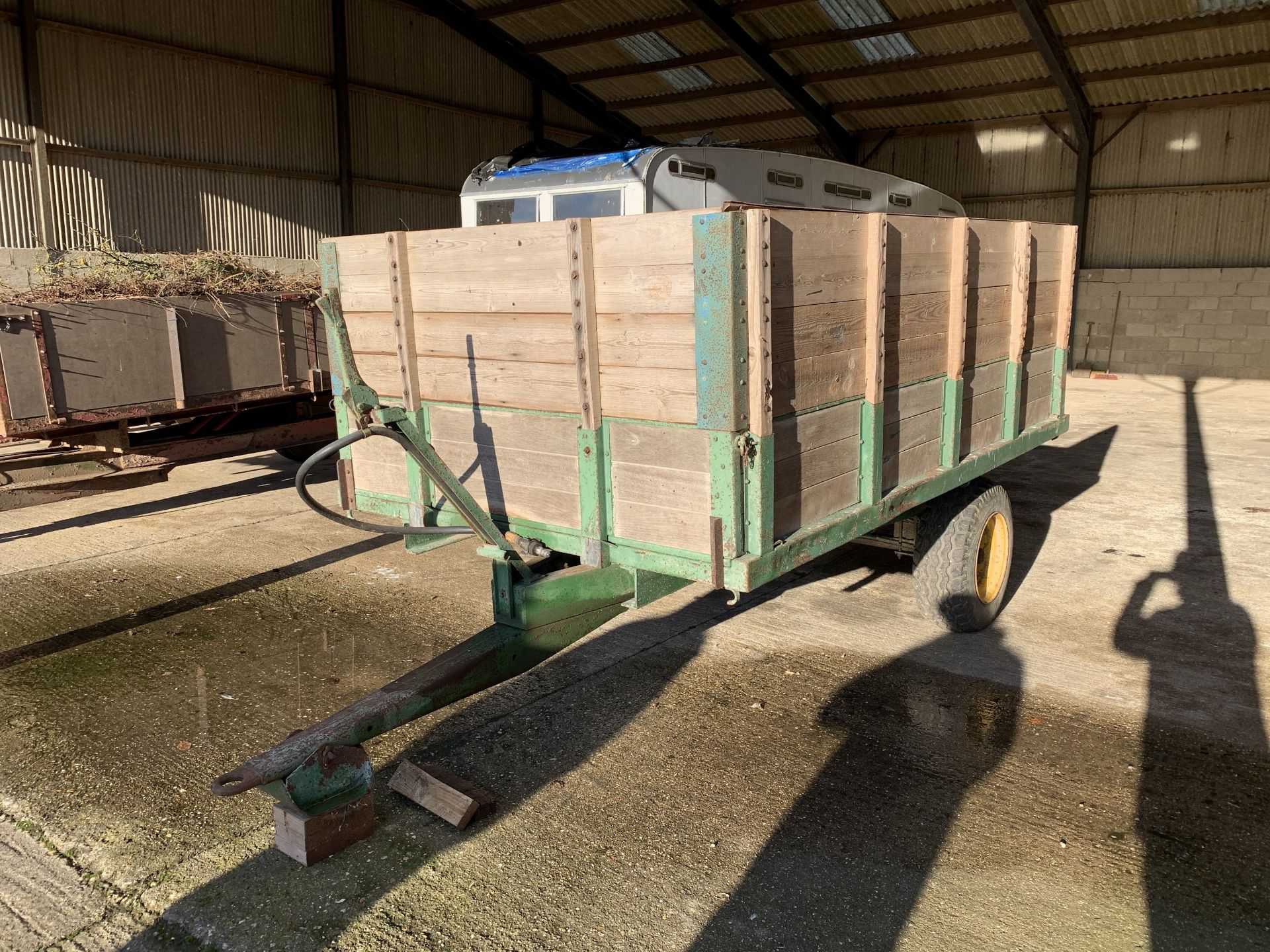 Wooden body single axle tipping trailer with side extensions