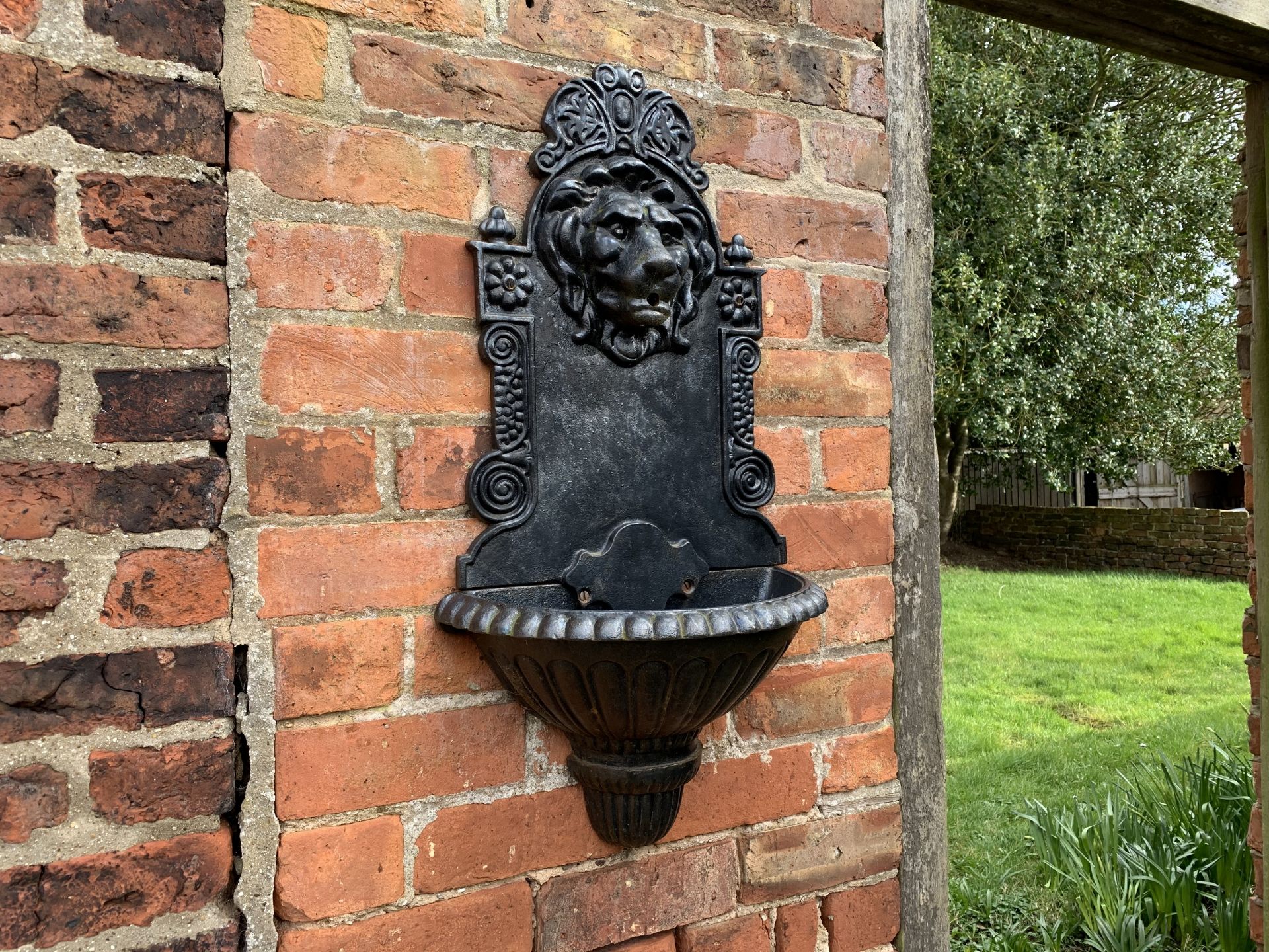 Cast wall decoration, ex fountain, buyer to remove