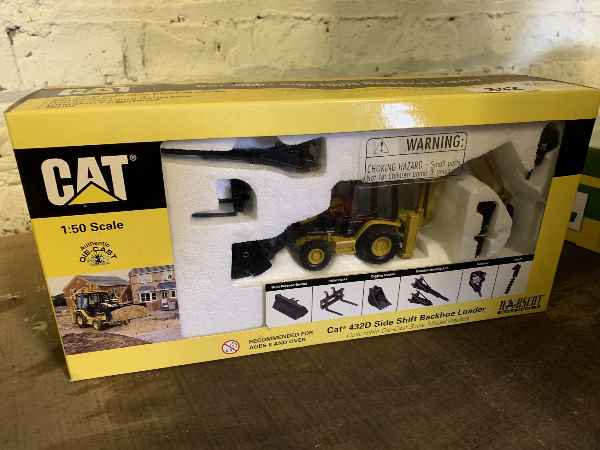 CAT 432D Side Shift Backhoe Loader 1:50 scale, unopened in box