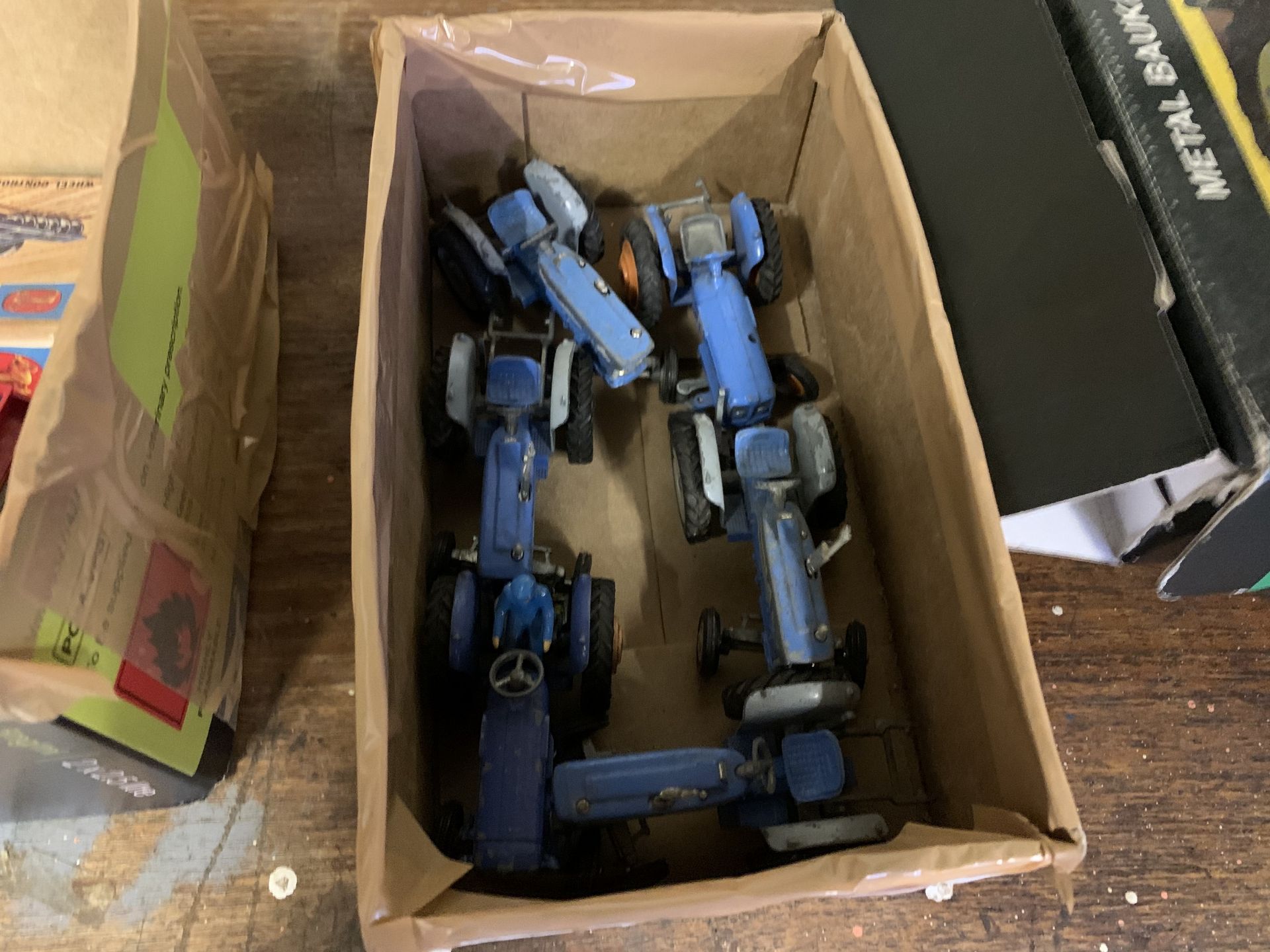 Box of 6 Ford tractors