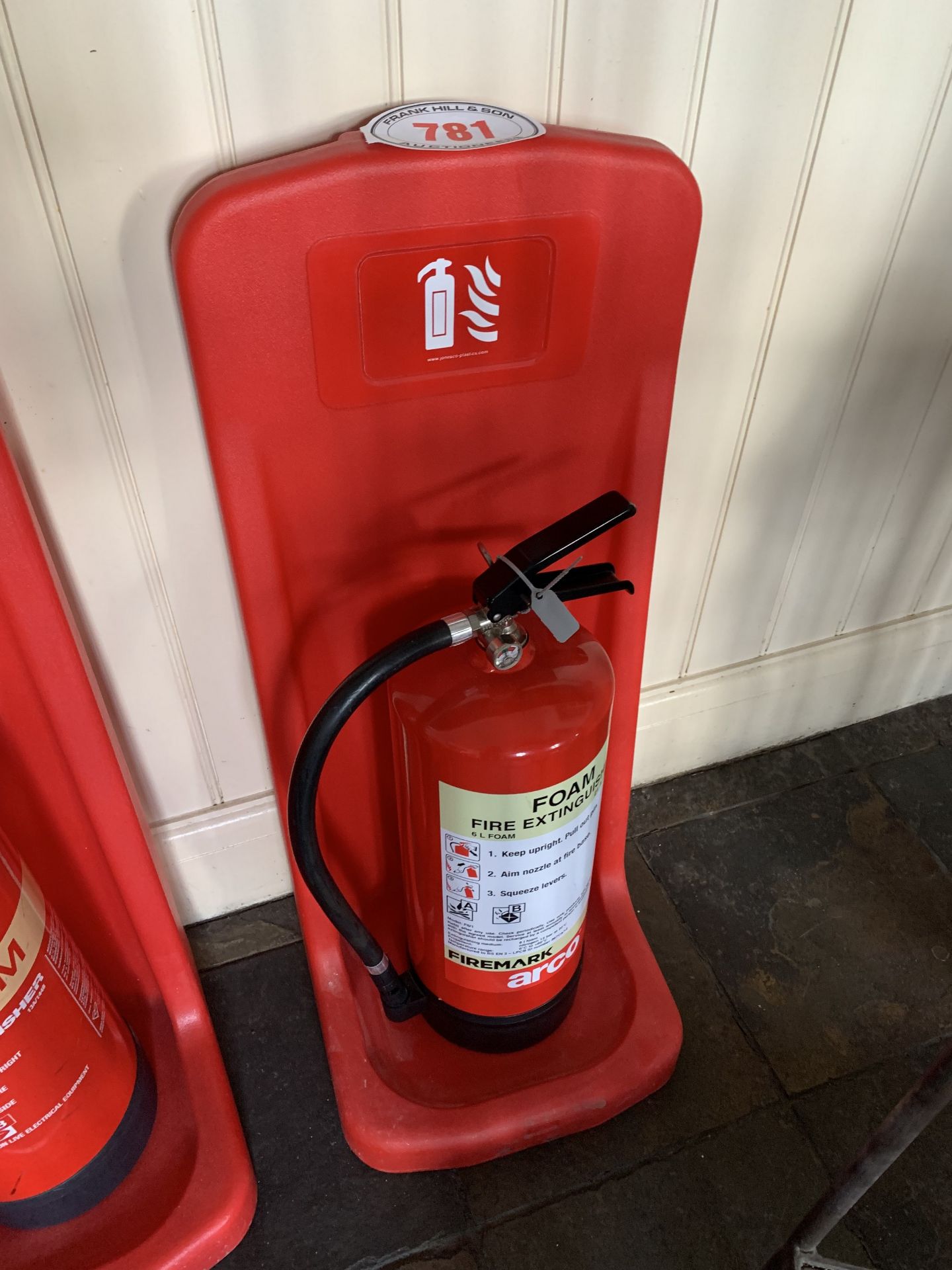 Fire extinguisher on stand