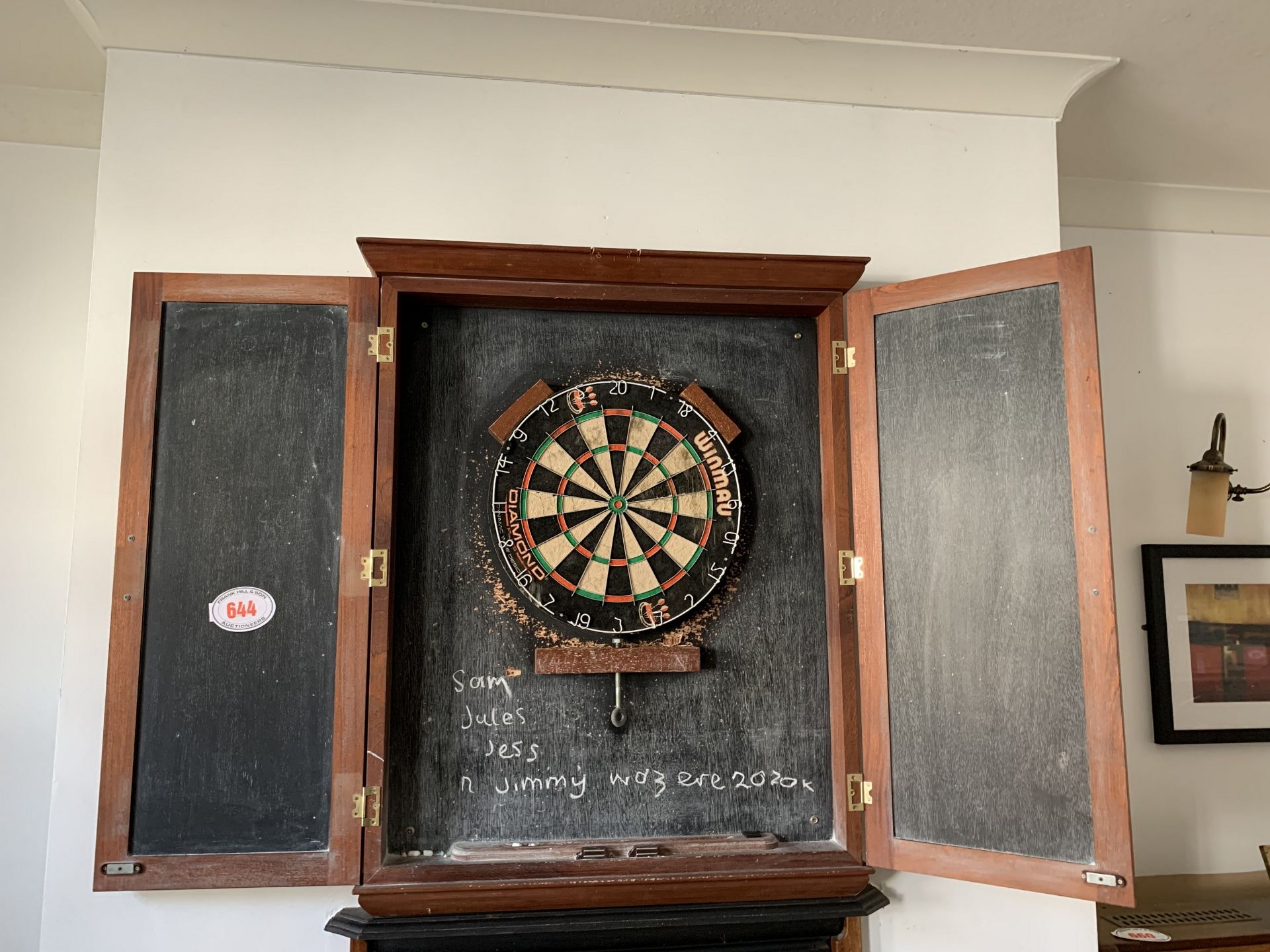 Dart board & casing - purchaser to remove