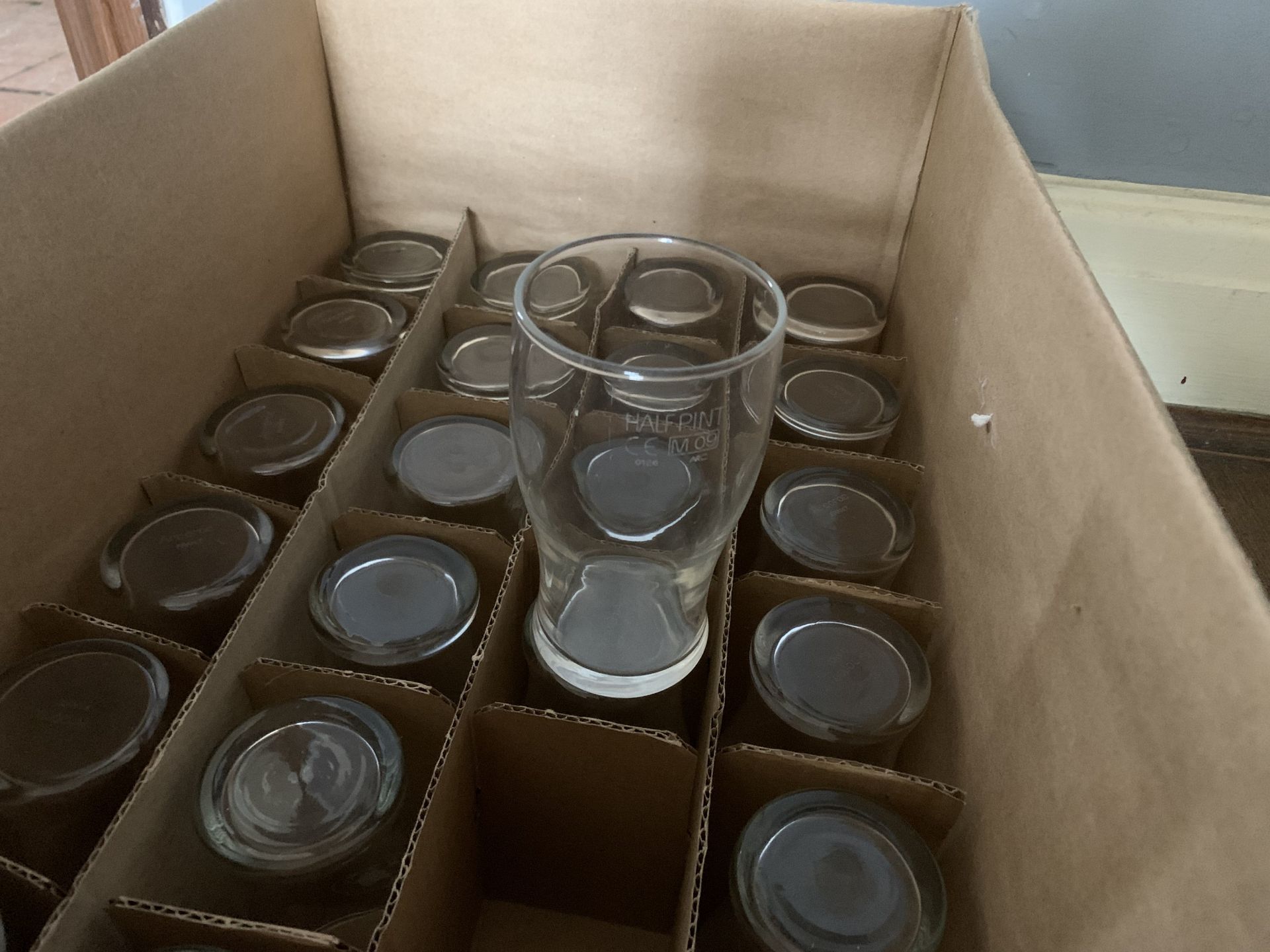 Box of half pint glasses