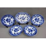 Set of six 19th century Cauldron blue and white plates and matching serving dish, (7)