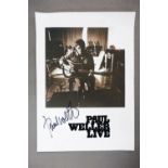 Paul Weller Live, a signed black and white photograph, unframed, 21 x 29cm