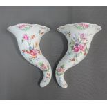 Pair of Royal Worcester porcelain cornucopia wall vases, with black printed backstamps, 25cm long (