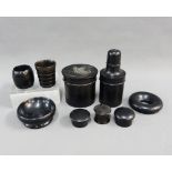 Collection of ebony boxes and containers, one in the form of a bottle, tallest 12cm, (8)