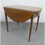 19th century mahogany Pembroke table on tapering legs with brass caps and castors, 74 x 90cm