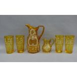Bohemian amber glass water set with etched stag and fern pattern, comprising water jug, four beakers