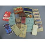 Early 20th century folding maps and other travel maps together with vintage tins, (a lot)