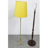 Two standard lamps one brass the other in dark wood, (2)