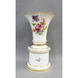 Continental porcelain vase with flared rim and transfer printed pattern of flowers together with