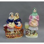 Two Scottish pottery fishwife figure groups, on oval gilt lined bases, tallest 24cm high (2)