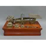 Set of 19th century mahogany and brass Ratcliffe postal scales, 27cm long