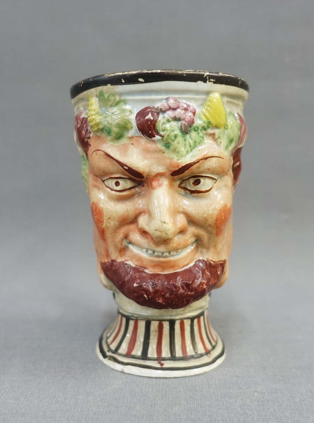 Pearlware Bacchus moulded cup, 11cm high