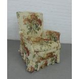 Armchair with loose floral cover, 82 x 68cm