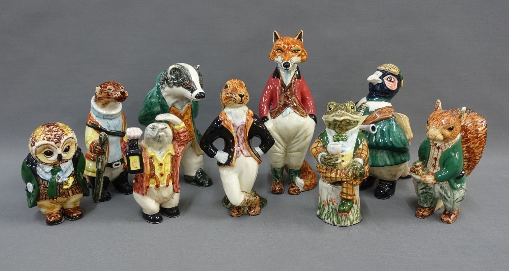 Set of nine Cinque Ports Country Gentleman pottery figures to include Sir Freddie Fox, badger, toad,