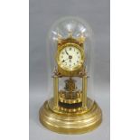 Gustave Becker brass anniversary clock, the dial with Arabic numerals, case numbered 1685081, with