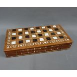 Chess set in a folding wooden board with faux ivory and faux ebony chessman (a lot)