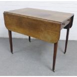 19th century mahogany Pembroke table, on square tapering legs with brass caps and castors, 75 x 90cm