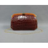Lady's vintage brown leather handbag with gilt metal chain